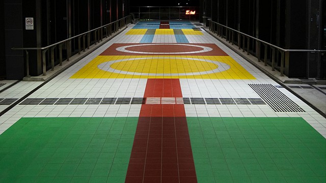 Colourful tiles inspired by 20th-century train tickets envelop Hoppers Crossing walkway