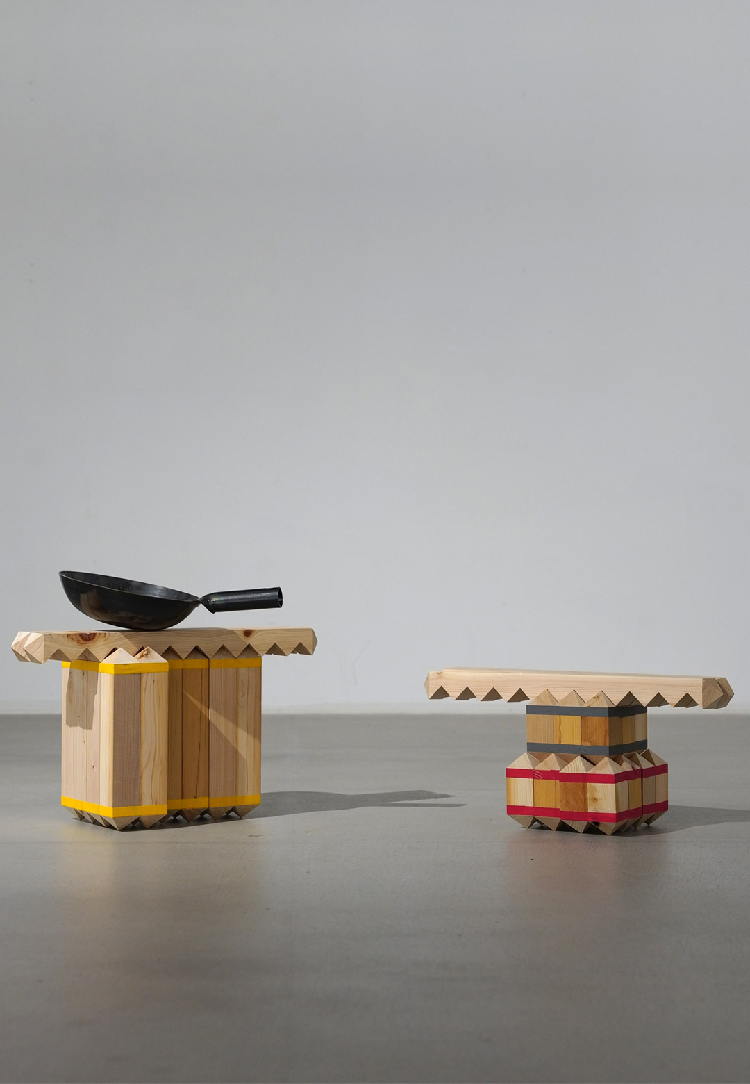 Deku by Takuto Ohta comprises wooden blocks stacked in different configurations