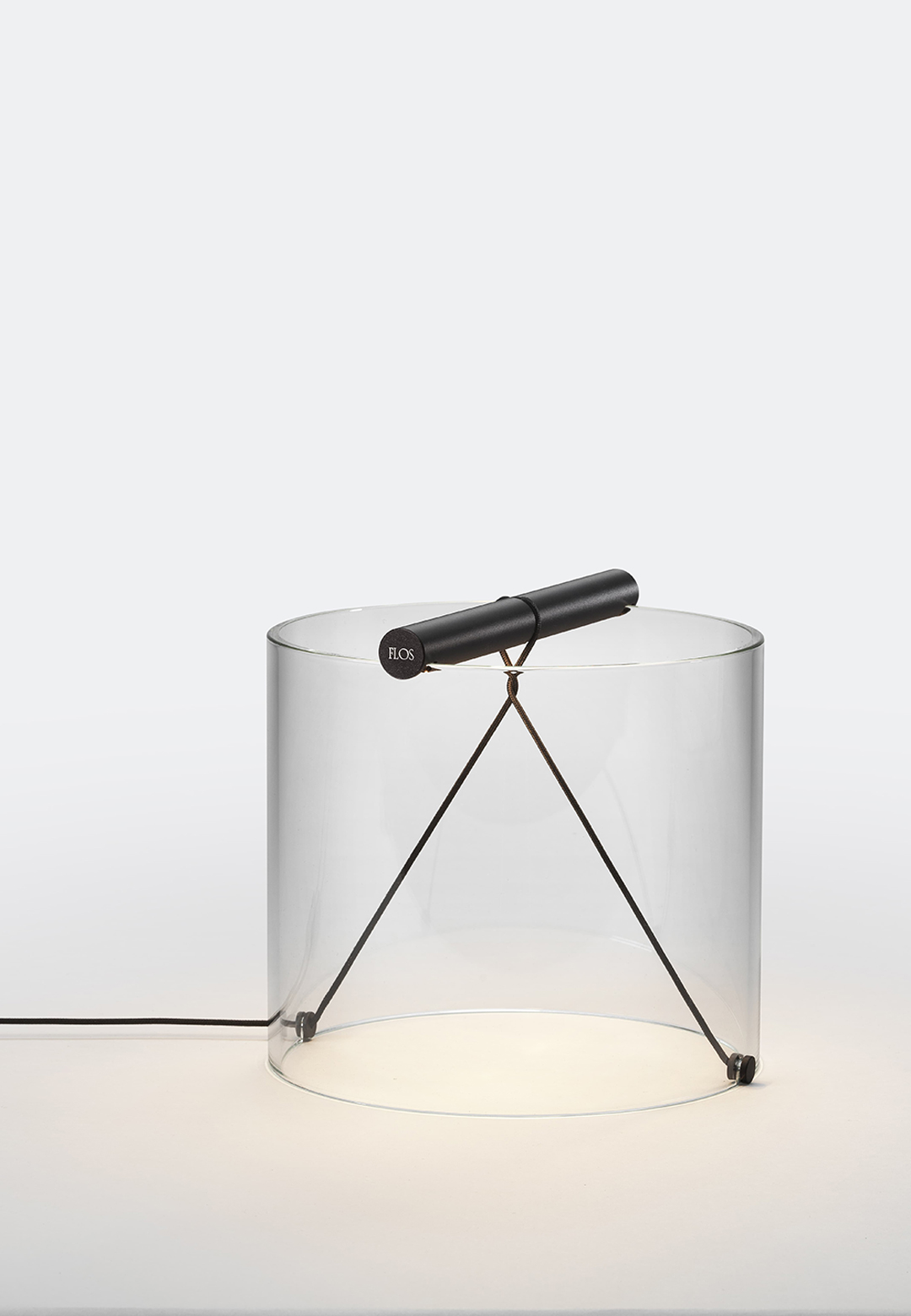 Guglielmo Poletti harnesses mechanical tension for Flos’ ‘To-Tie’ lamps