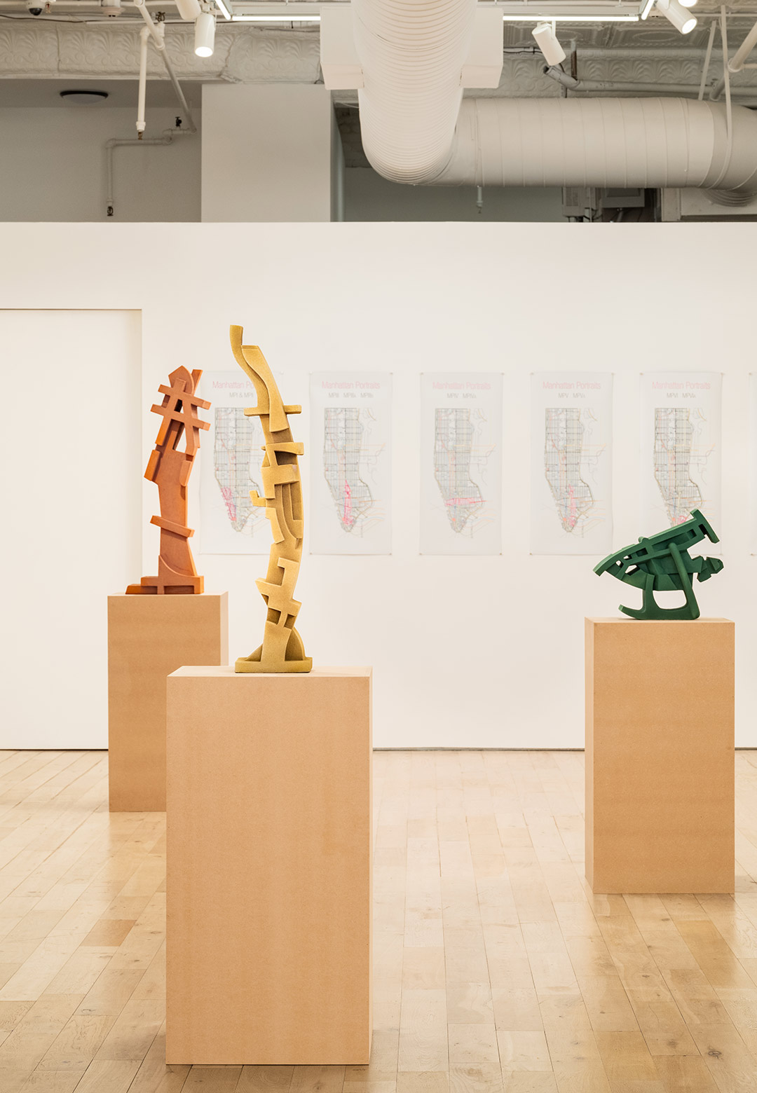 HB381 frames the monochrome terracotta 'Manhattan Portraits' by Karen Bennicke