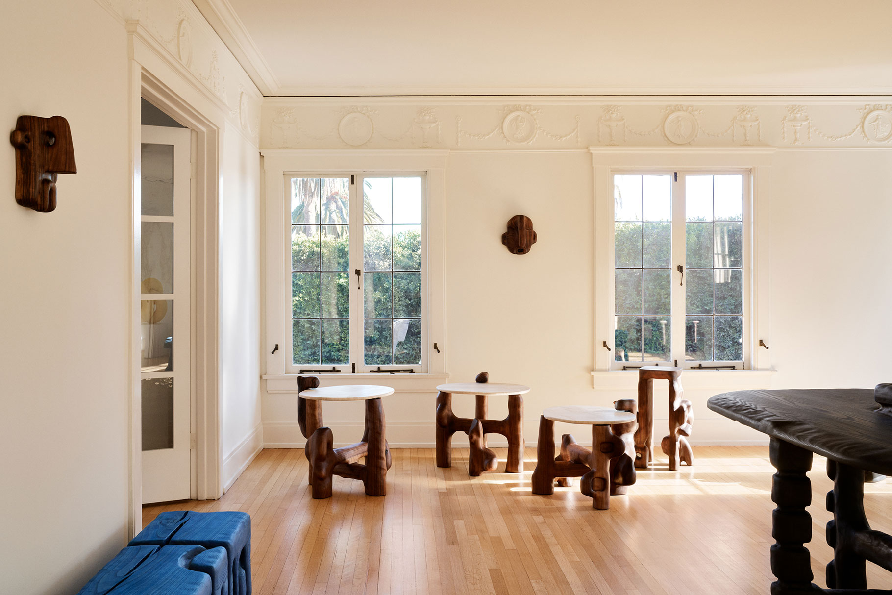 Casey McCafferty creates a series of intricately carved wooden furniture pieces