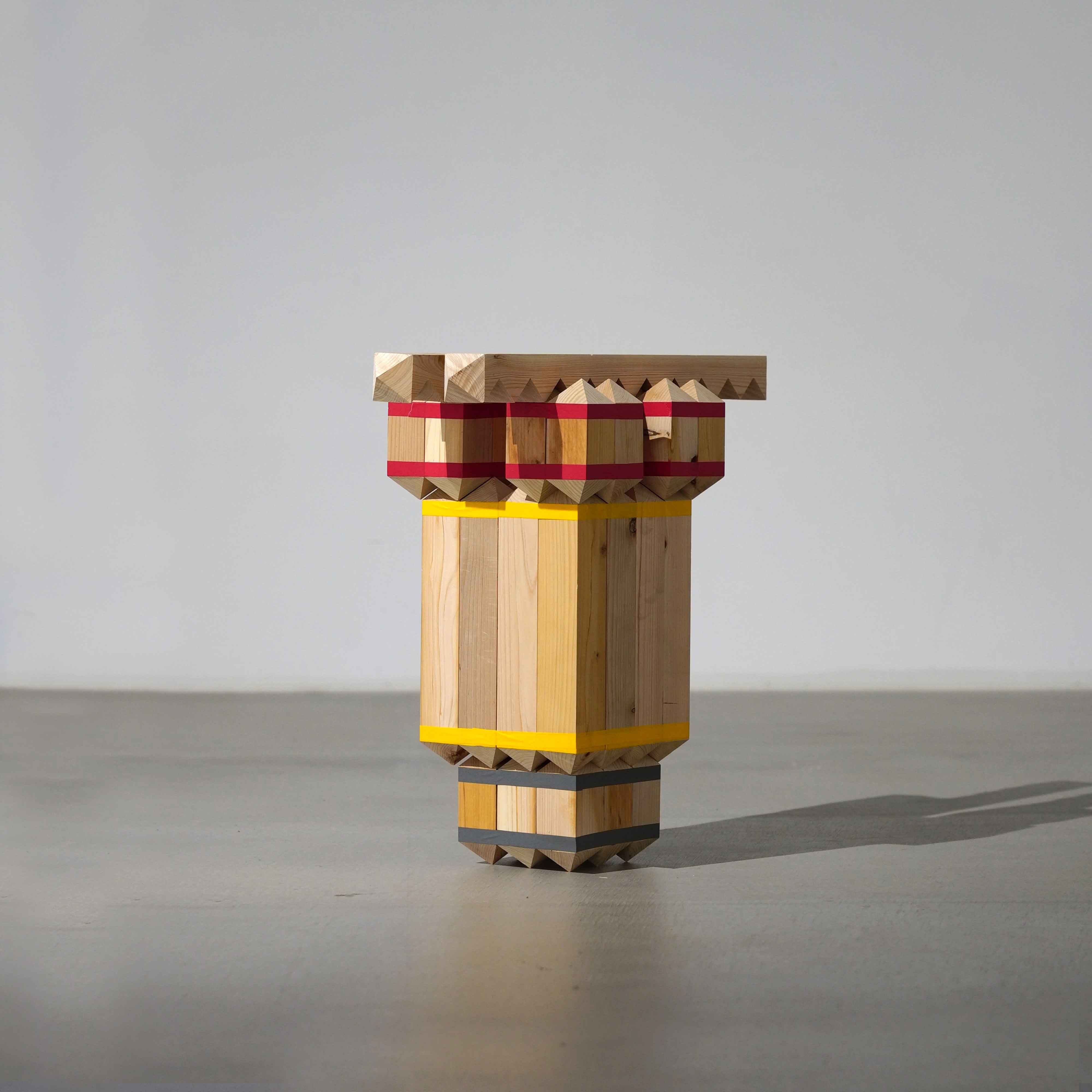 deku-by-takuto-ohta-comprises-wooden-blocks-stacked-in-different-configurations