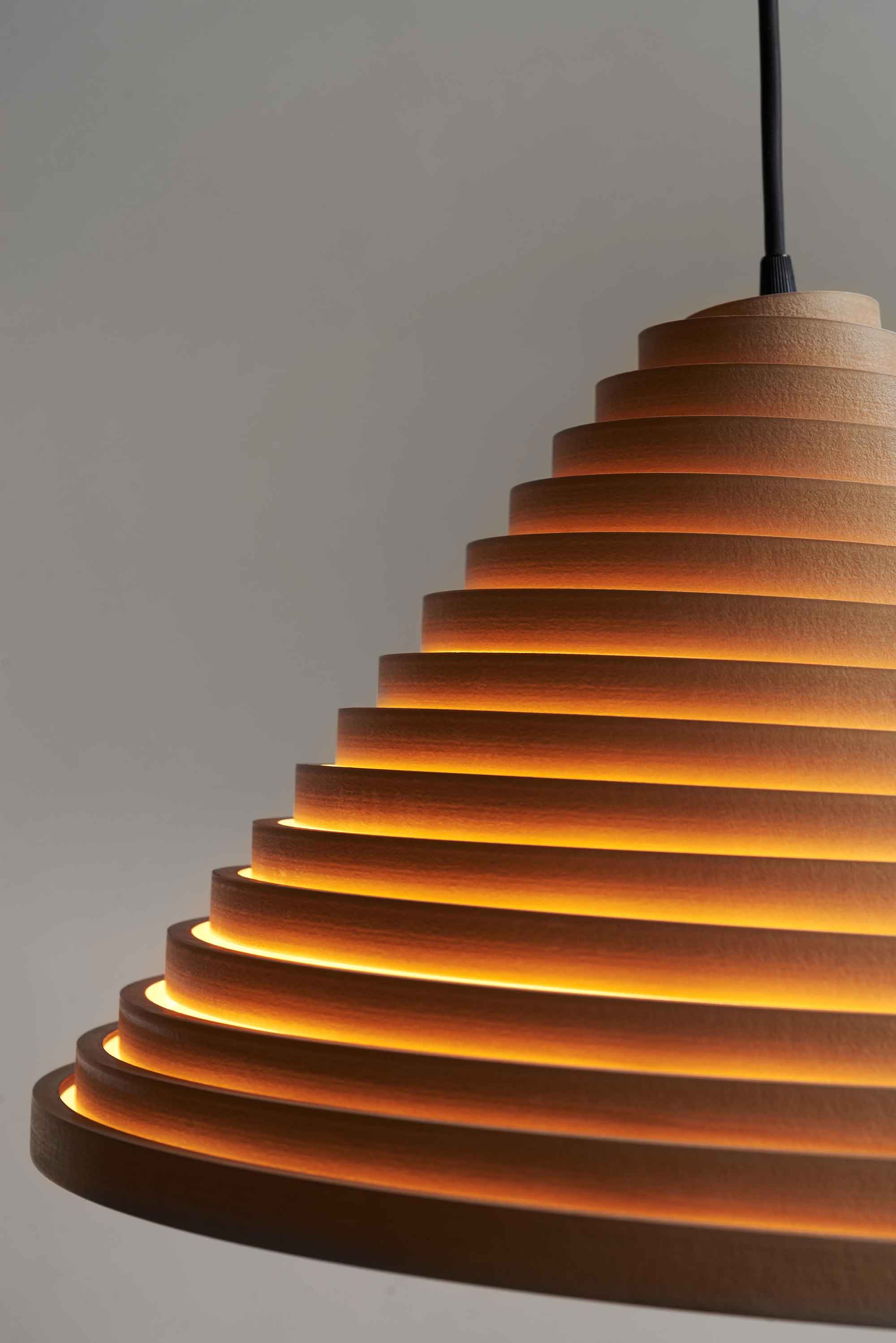 guillermo-lean-s-spinel-is-a-collapsible-pendant-light-made-of-plywood