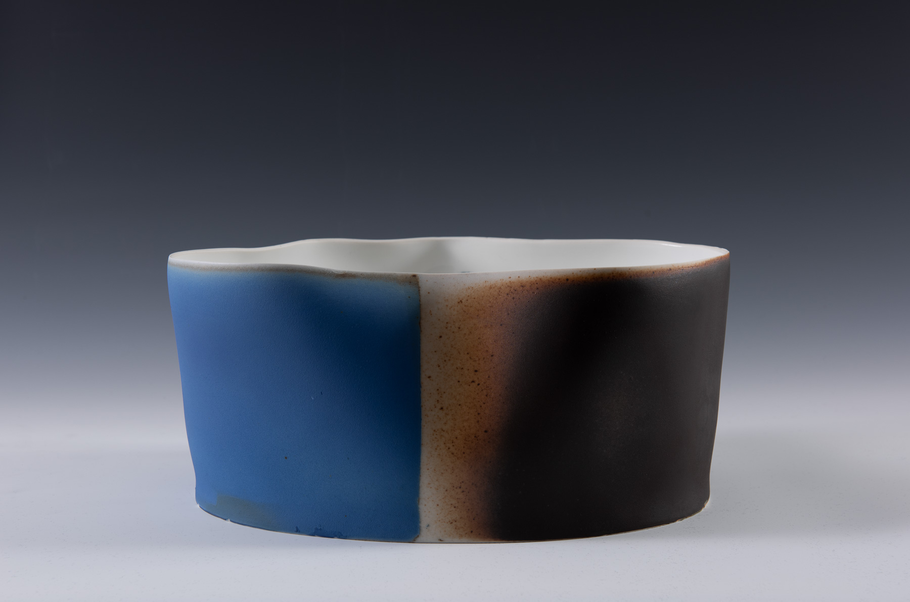 Heuch works with with cast porcelain and glazes