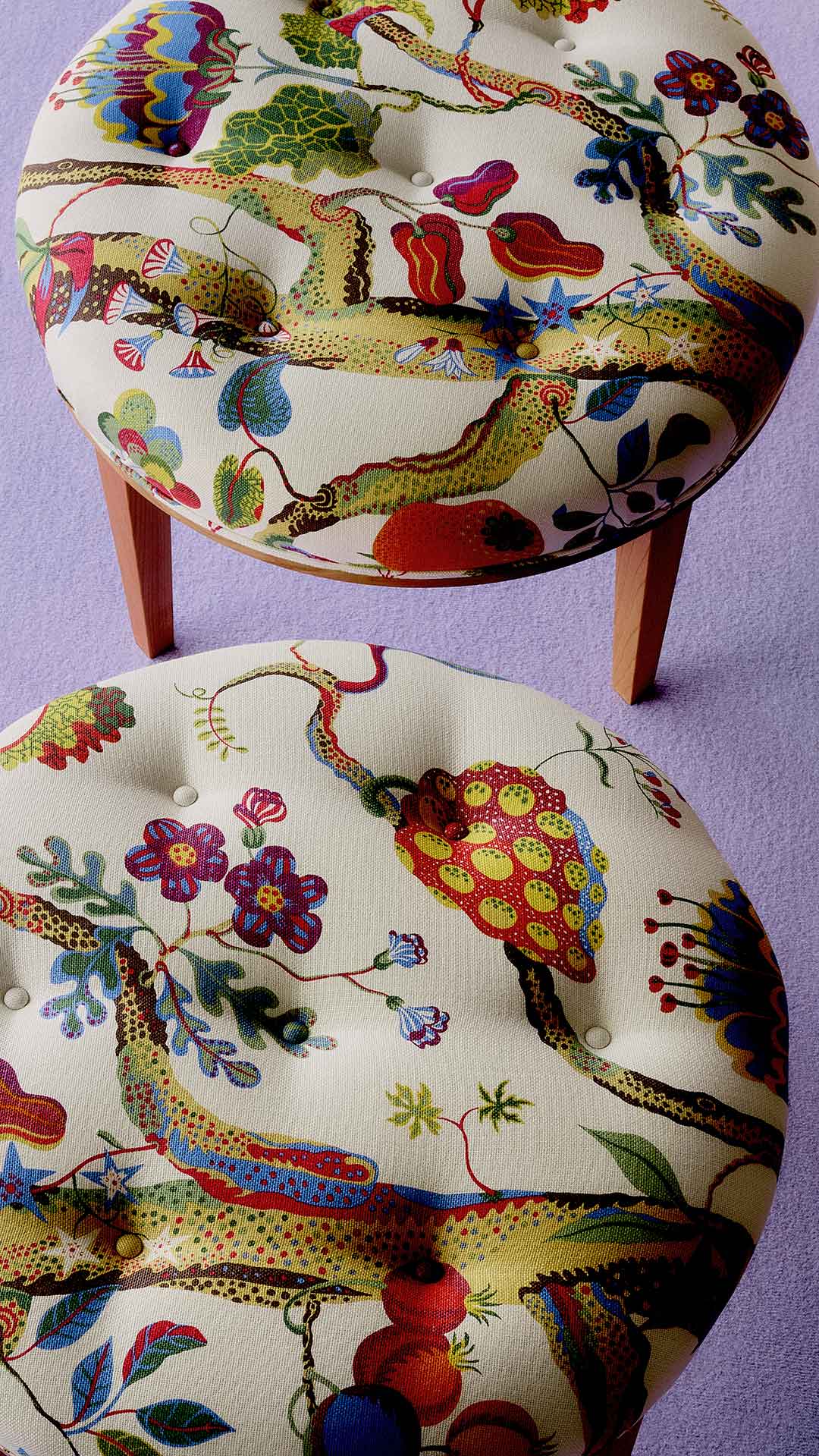 Originally designed by Josef Frank, the textile design contrasts sharply with the standardized interiors