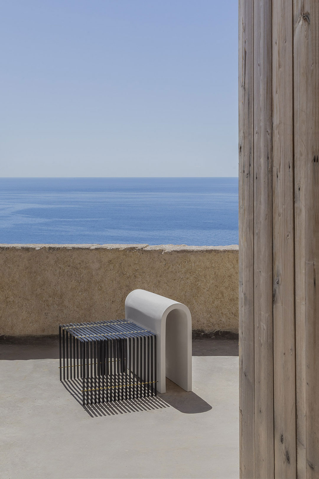 The benches feature a composition of solids and voids