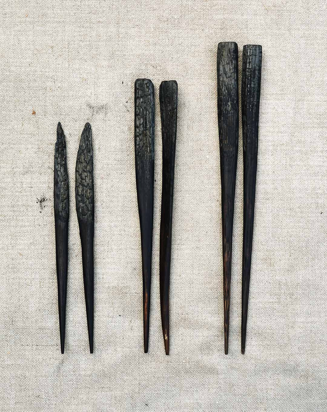 Burnt wood chopsticks by Lukas Cober