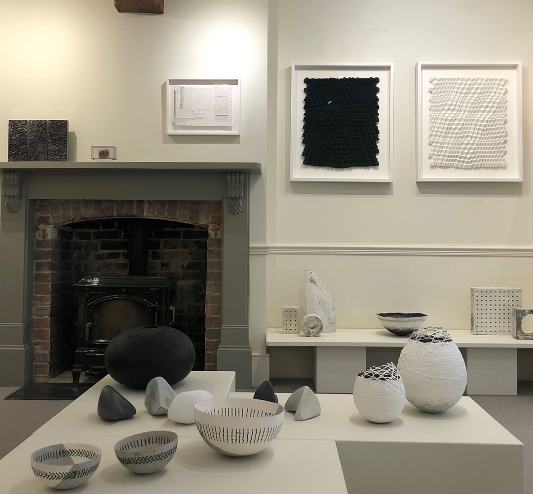 The exhibition highlights multiple materials such as wood, ceramic, metal and textiles