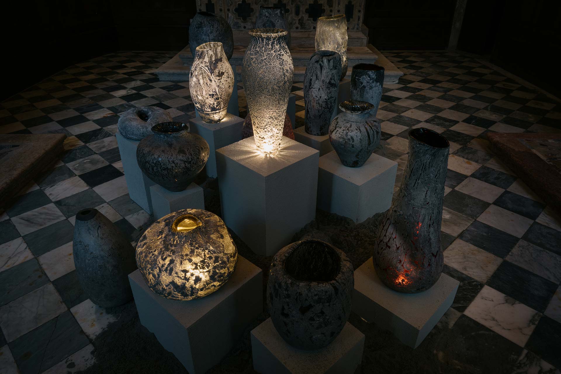 The scenographic design of the exhibition consists of a lighting installation