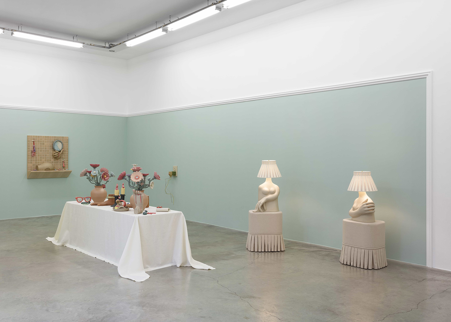 The buffet table and sculptural lamps on display