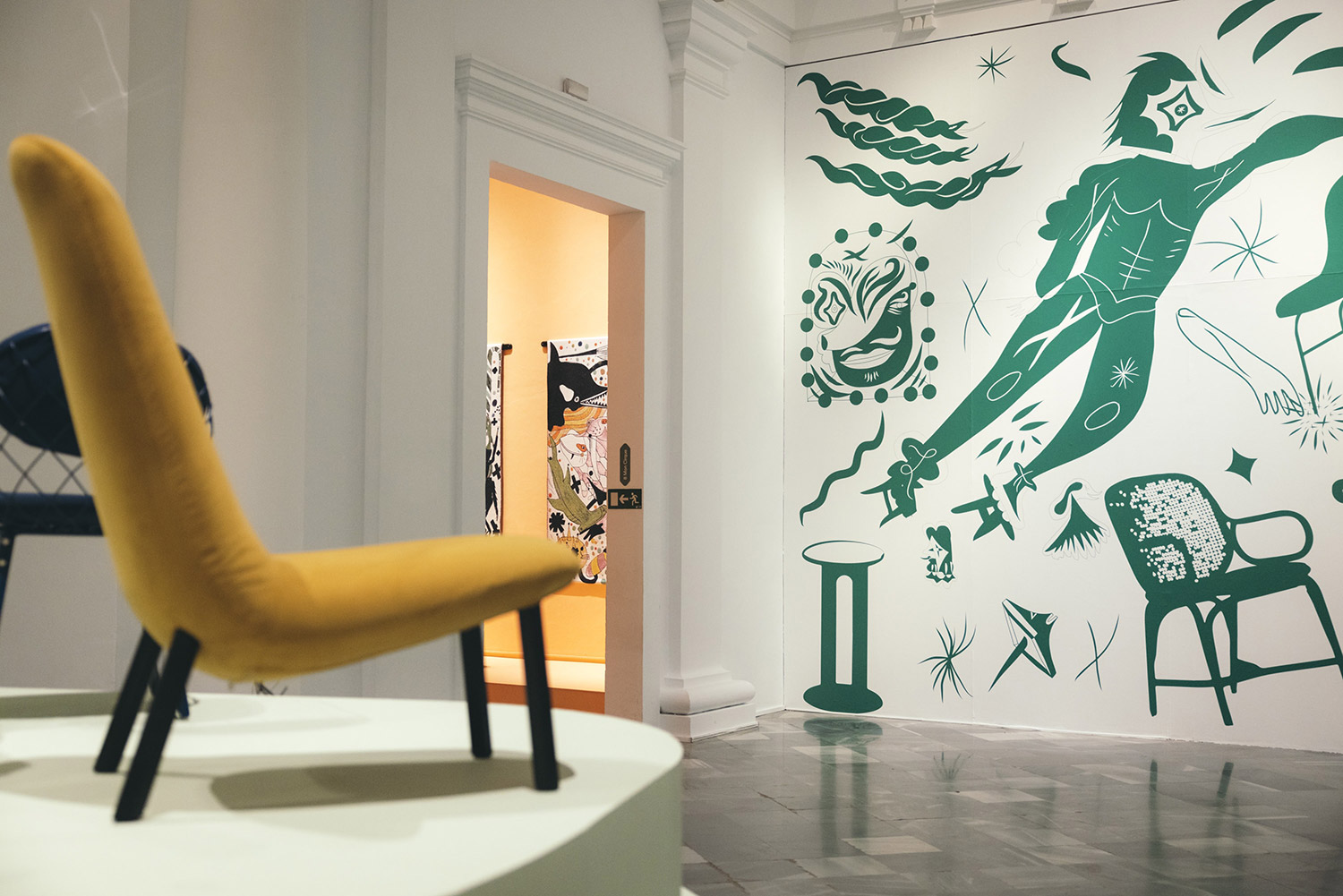 The exhibition hosts products, furniture designs, tapestries and artworks by Jaime Hayon
