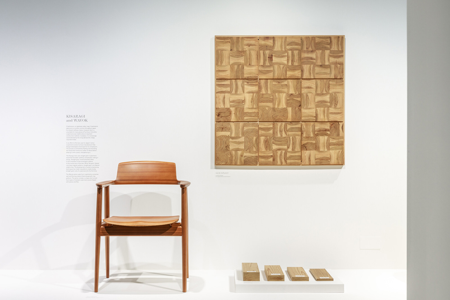 The Kisaragi chair and the wooden artwork from the Wavok series