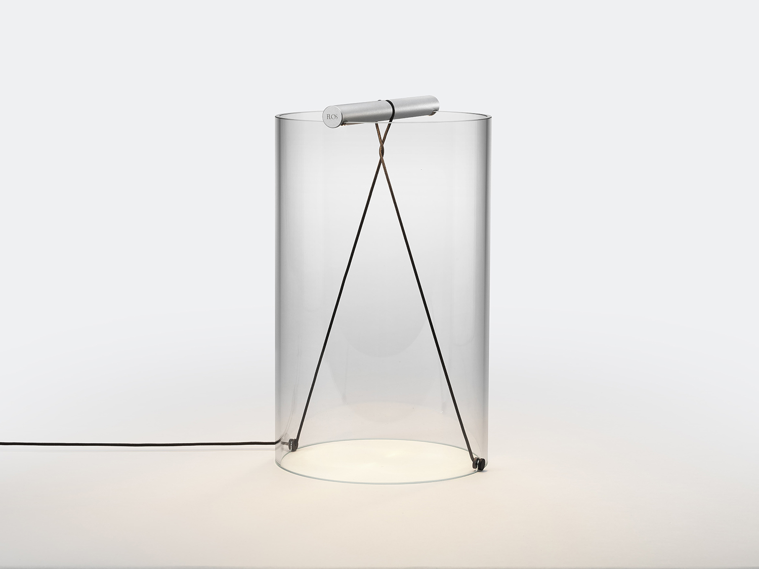 The tall version of the To-Tie anodized aluminium grey lamp