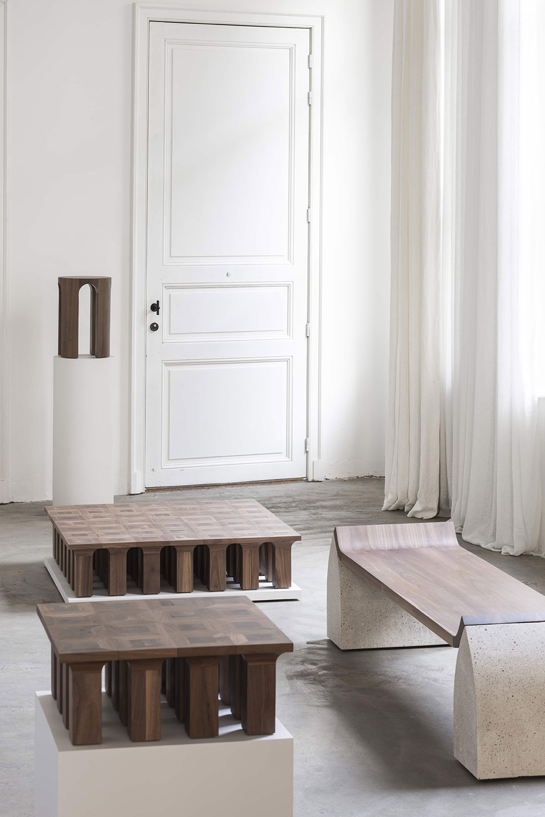 Arcus coffee table and Traaf bench on display at the Rhythmic Echoes exhibition